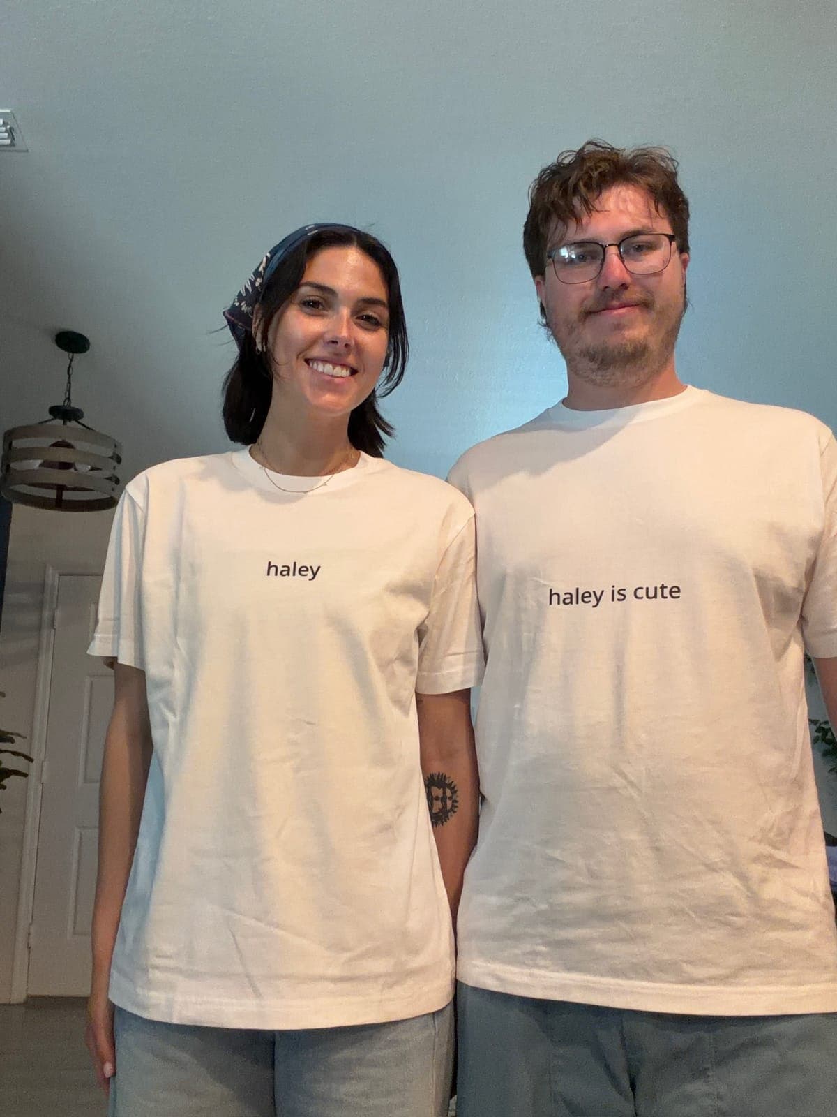 Haley and Slade in matching shirts that read 'haley' and 'haley is cute'